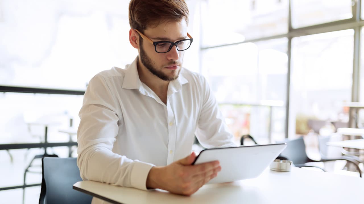 A man working on a tablet